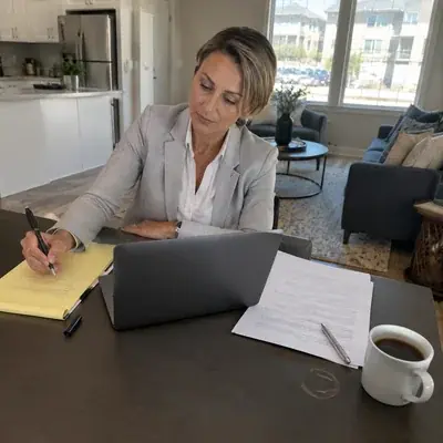 A licensed apartment locator's workspace in Fort Worth
